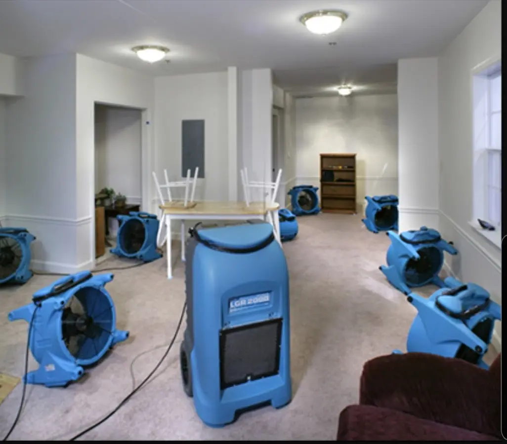 Air movers and dehumidifier setup for Water Extraction & Removal in Bradford